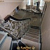 Изогнутая лестница с винтовыми коваными перилами Код: КВЛ-32/82
