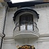 Кованый пузатый полукруглый балкон с козырьком Код: БО-0117/68