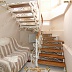 Белая кованая лестница с дубовыми ступенями Код: КЛ-62/91